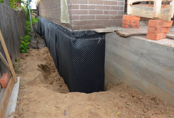 SJ Waterproofing Pros technician performing targeted Waterproofing assessment in Taylor, AL
